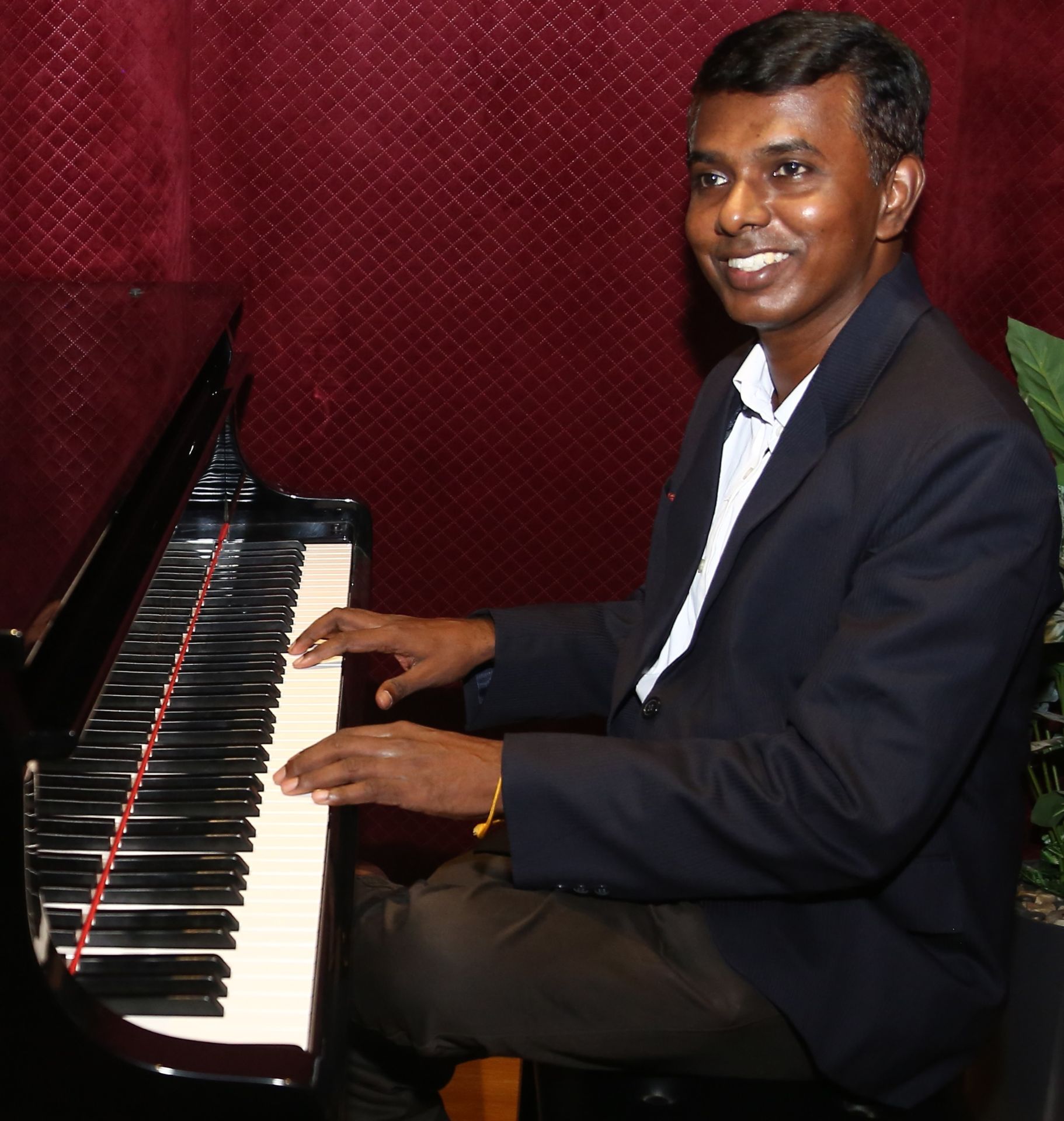 S. Yuvaraj - Trinity Grade 8 Certified Piano Instructor at Tune Rockers Music Academy offering online piano lessons